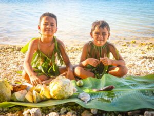 Kids ready to eat on the beach