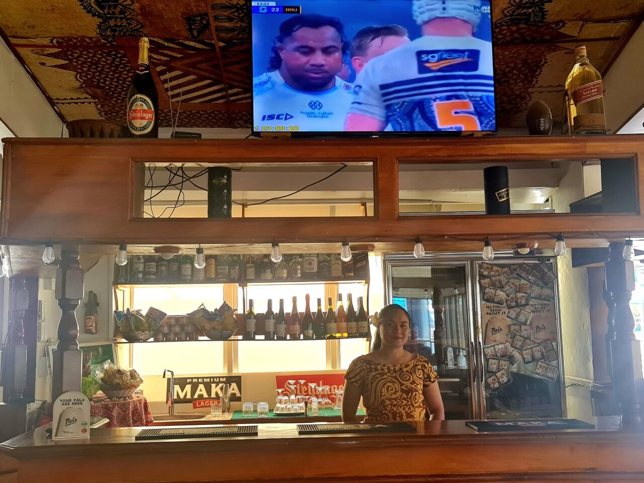 Bar maid behind the bar at Hotel Nuku'alofa